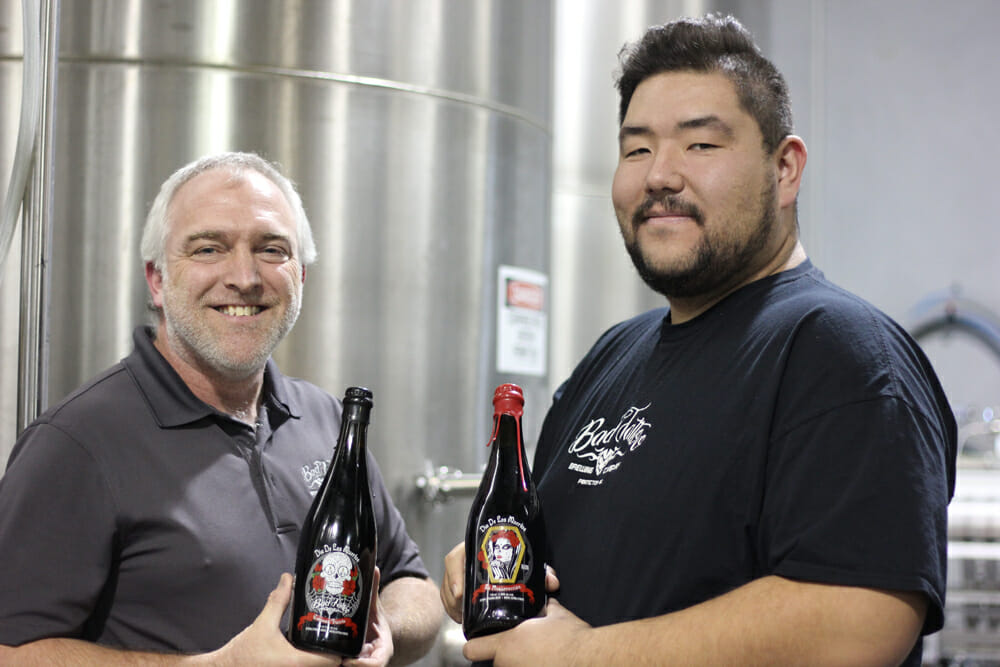 Bad Tattoo's Derek Hurst (left) and Robert Theroux holding Cerveza Fuerte and La Resurreccion. (Photo: Kim Lawton)