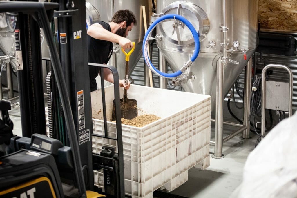 Chris Vandenberg brewing a batch of beer