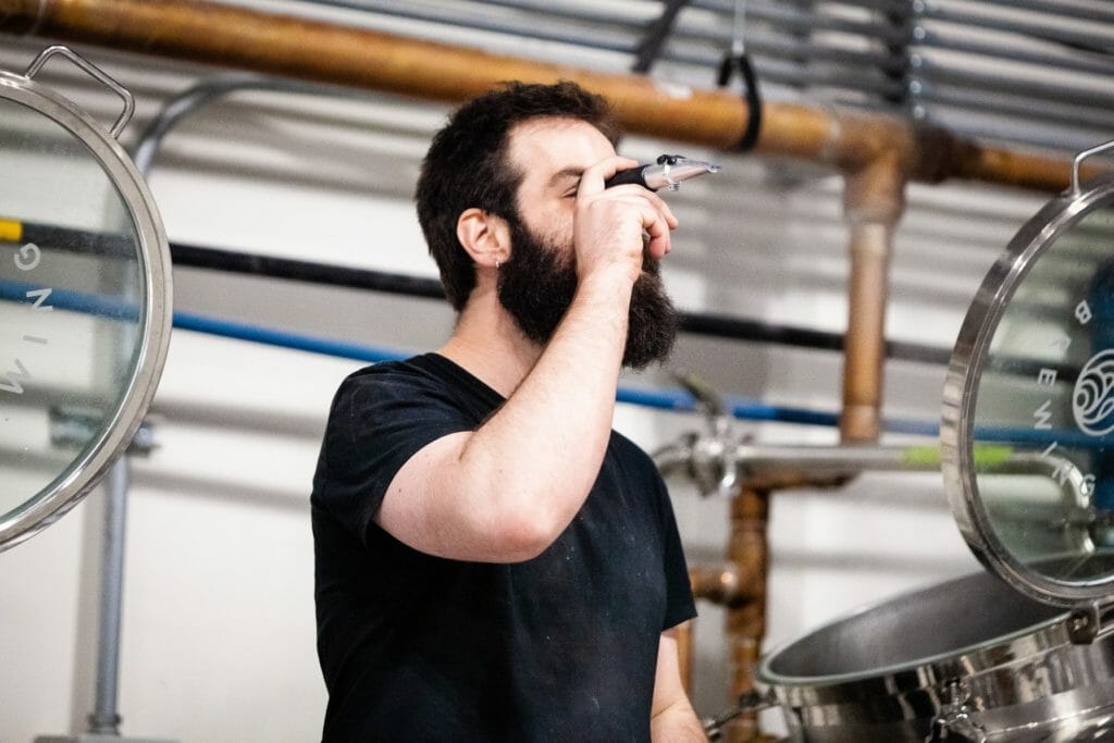 Chris at work at Slackwater Brewing