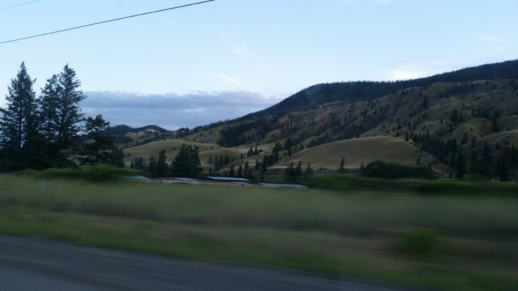 image of rolling hills and ranch in Chilcotin region of BC