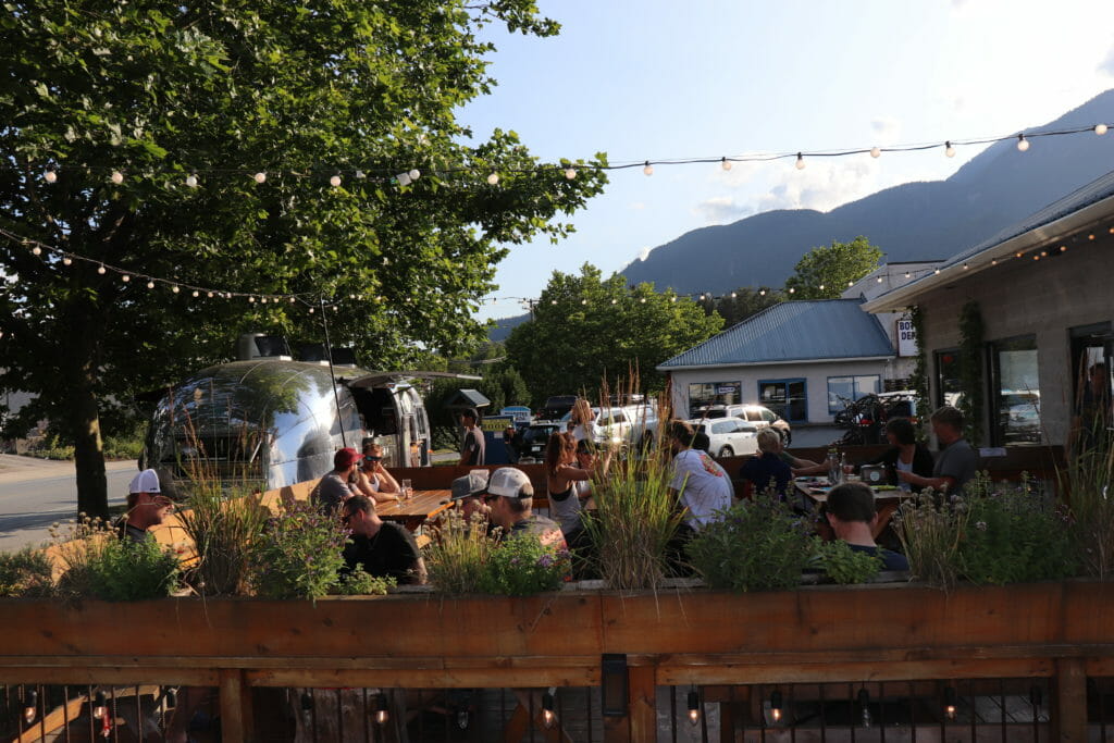 A-Frame Brewing's patio full of people in Squamish