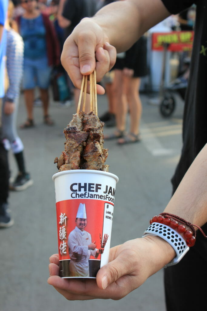 image of lamb skewers being held in a Chef James cup at Richmond Night Market