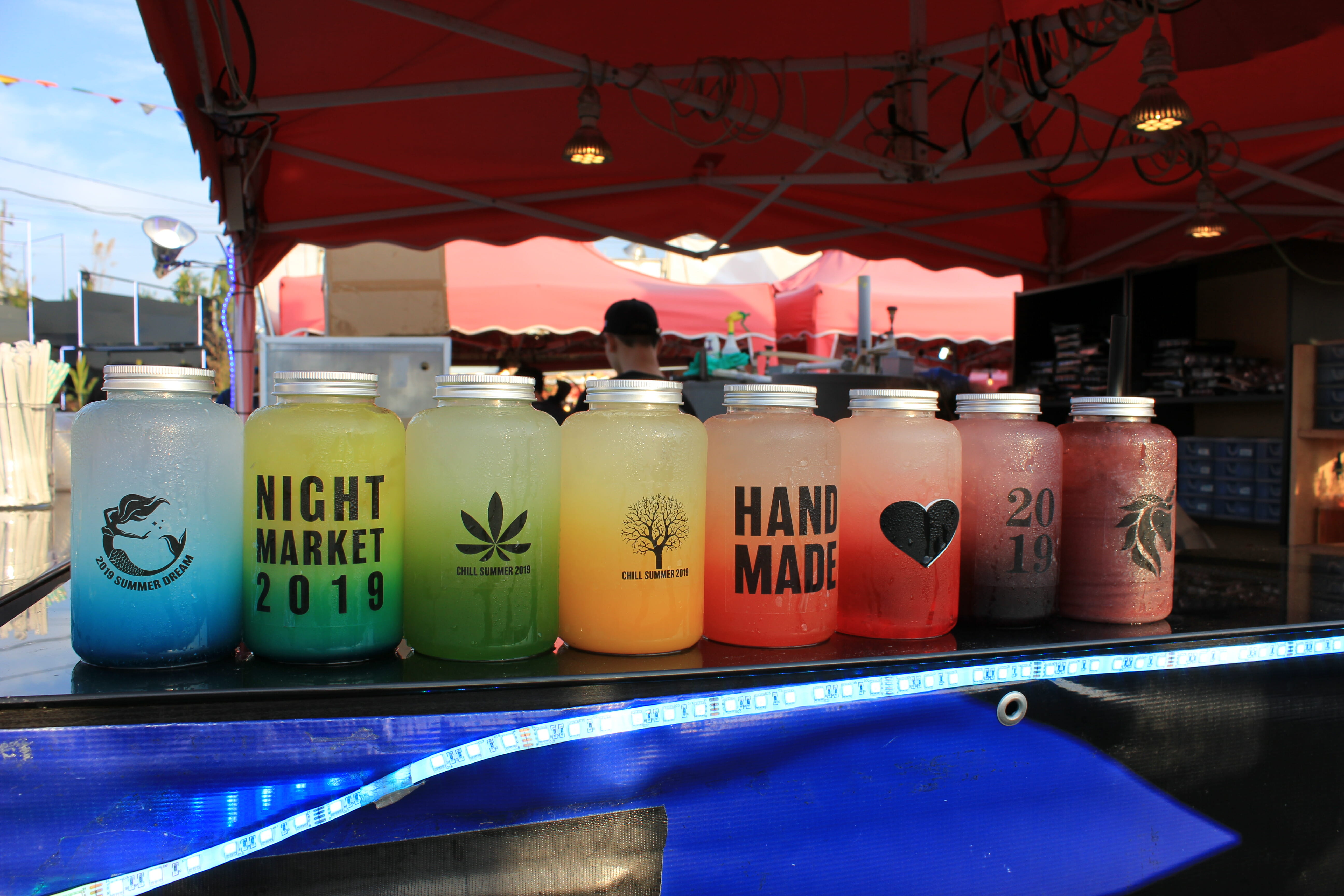 a lineup of colourful virign cocktails at Richmond Night Market