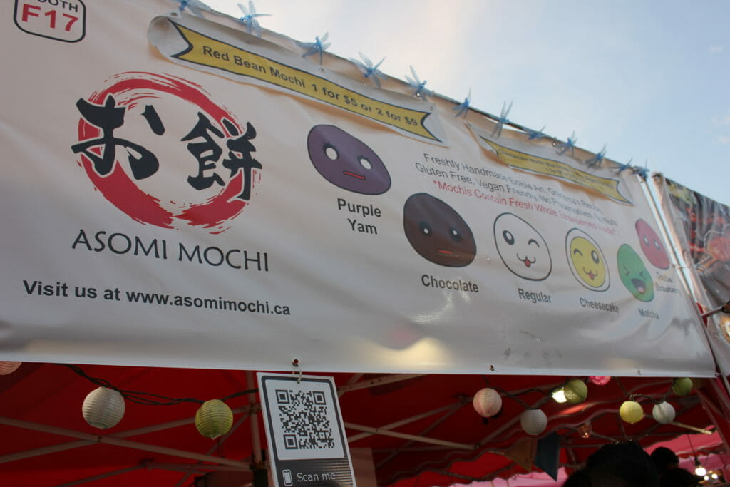 image of Asomi food stall serving strawberries covered in rice paste