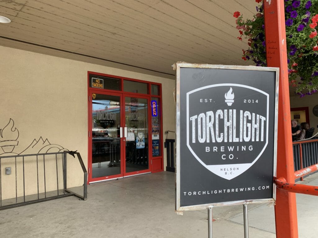 sign and front door of Torchlight Brewing Co.