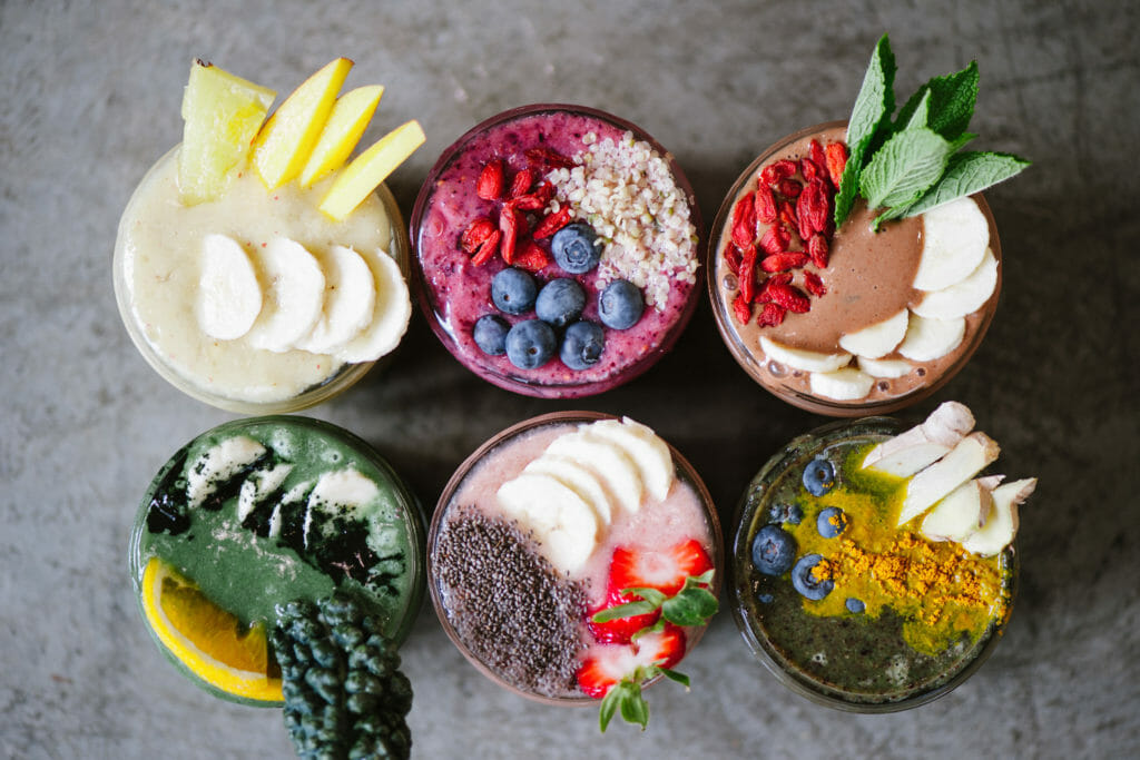 six smoothies with organic, dairy-free toppings from Green Moustache in Whistler, BC