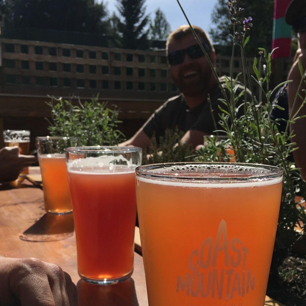 pints on a sunny day in Whistler at Coast Mountain Brewing