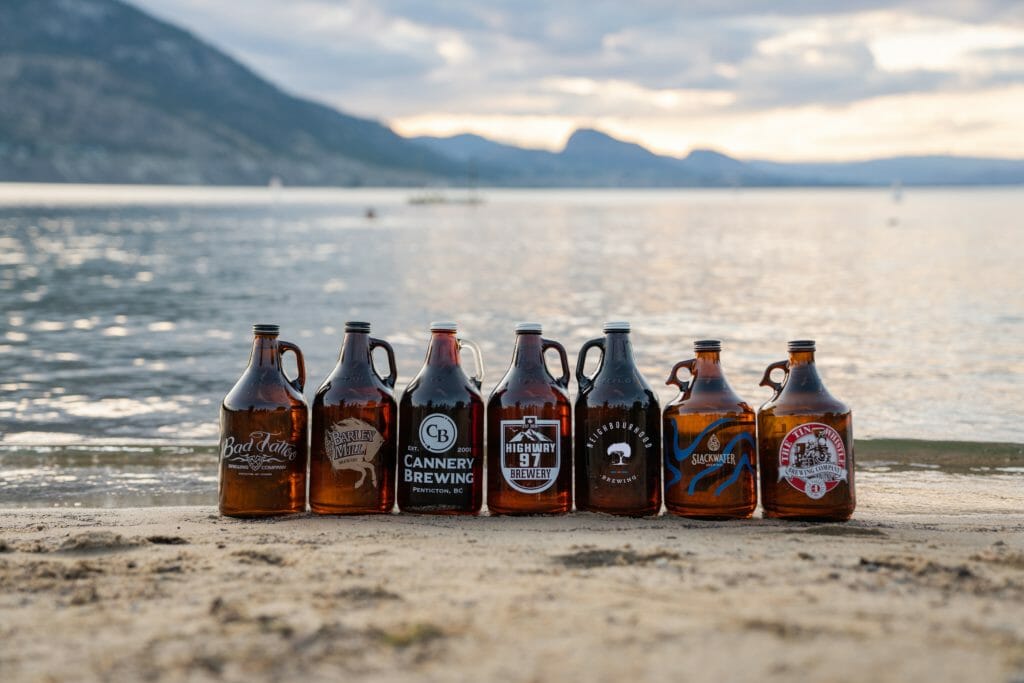 seven growlers from the seven breweries participating in Penticton Beer Week collaborative brew