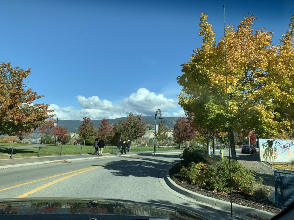 fall foliage and people walking in Penticton