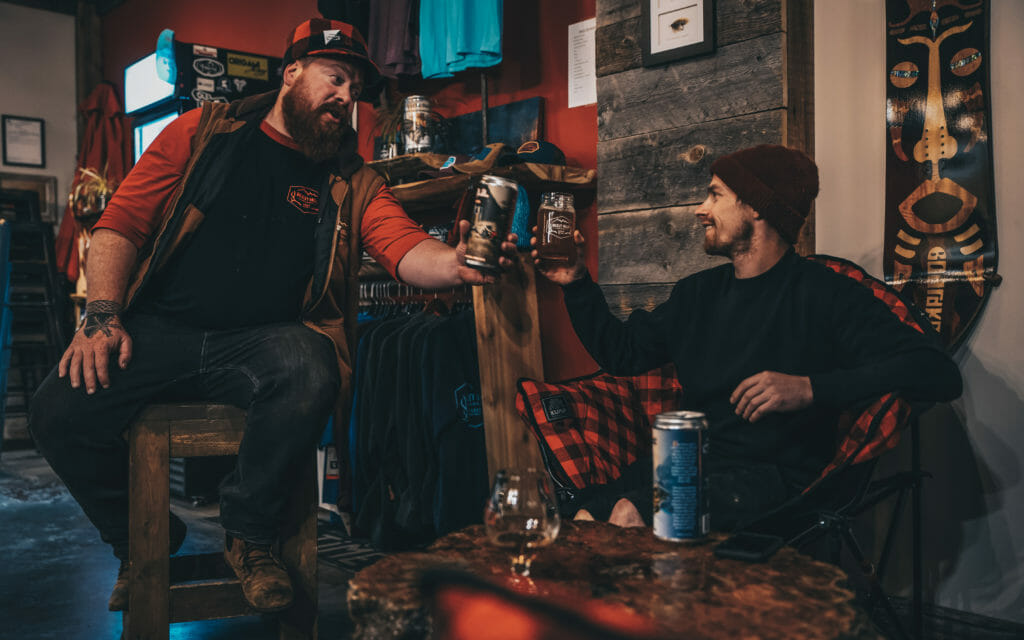 image of Dave and Mark cheersing their beers at Bulkley Valley Brewery in Smithers, BC