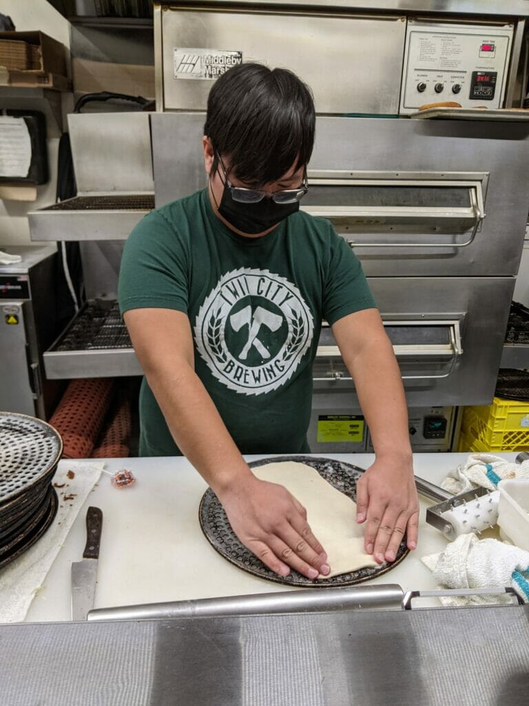 Pizza making at Twin City Brewing