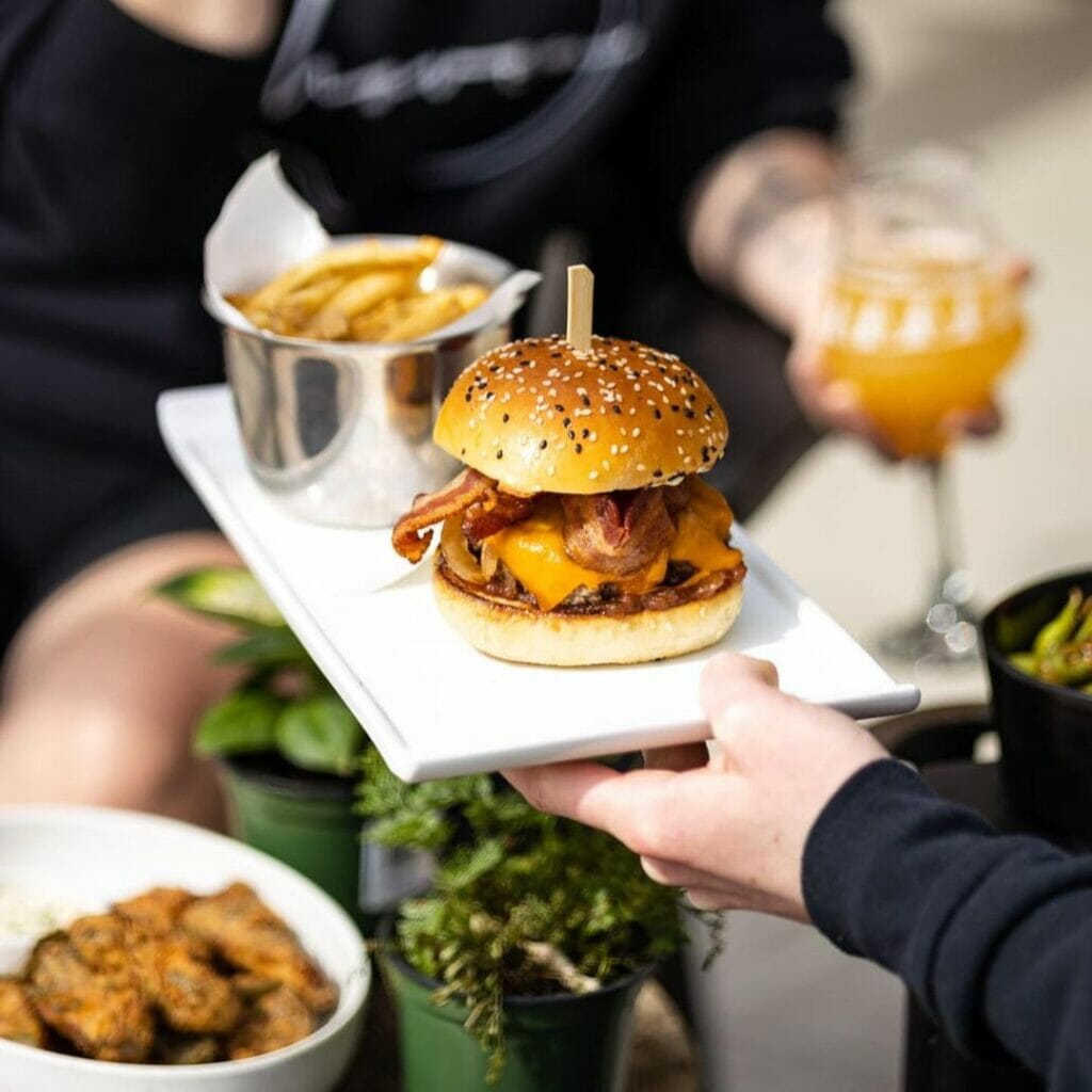 Camp Beer Co patio with burgers and beers in Langley on the BC Ale Trail