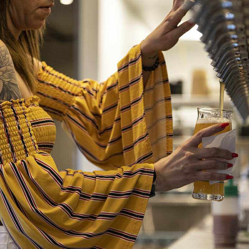 Pouring a pint at Neighbourhood Brewing