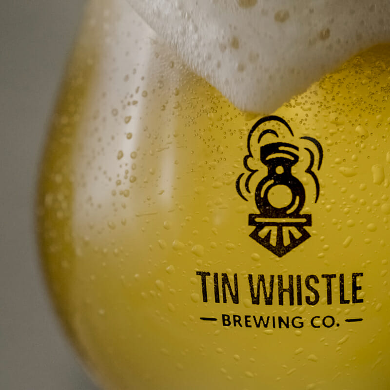 A glass of beer from Tin Whistle Brewing