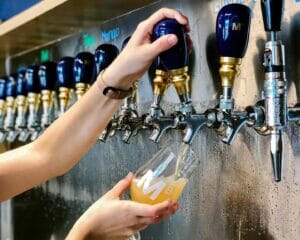 Pouring a pint at Mariner Brewing