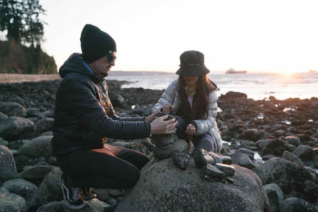 Miguel Molina and his daughter, hanging out at the beach in Vancouver