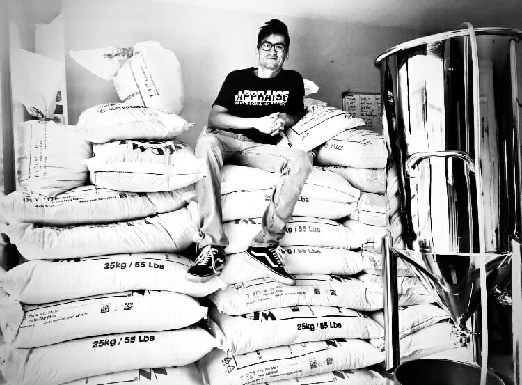 Miguel Molina with his first batch of grain at his brewery in Ecuador