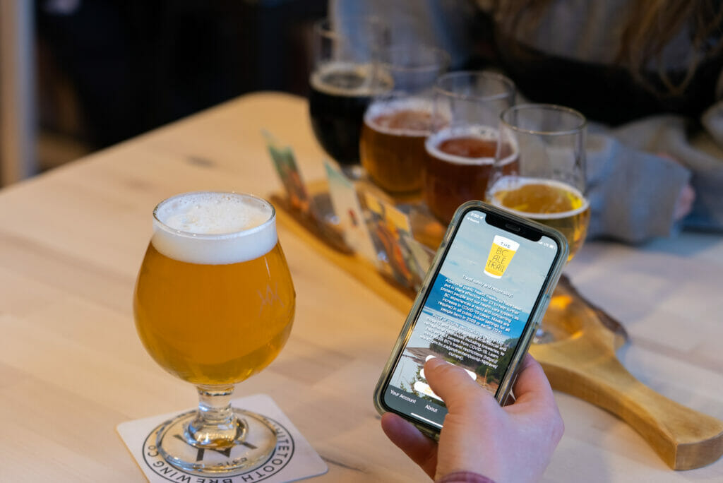 Checking in on the BC Ale Trail App while enjoying a beer