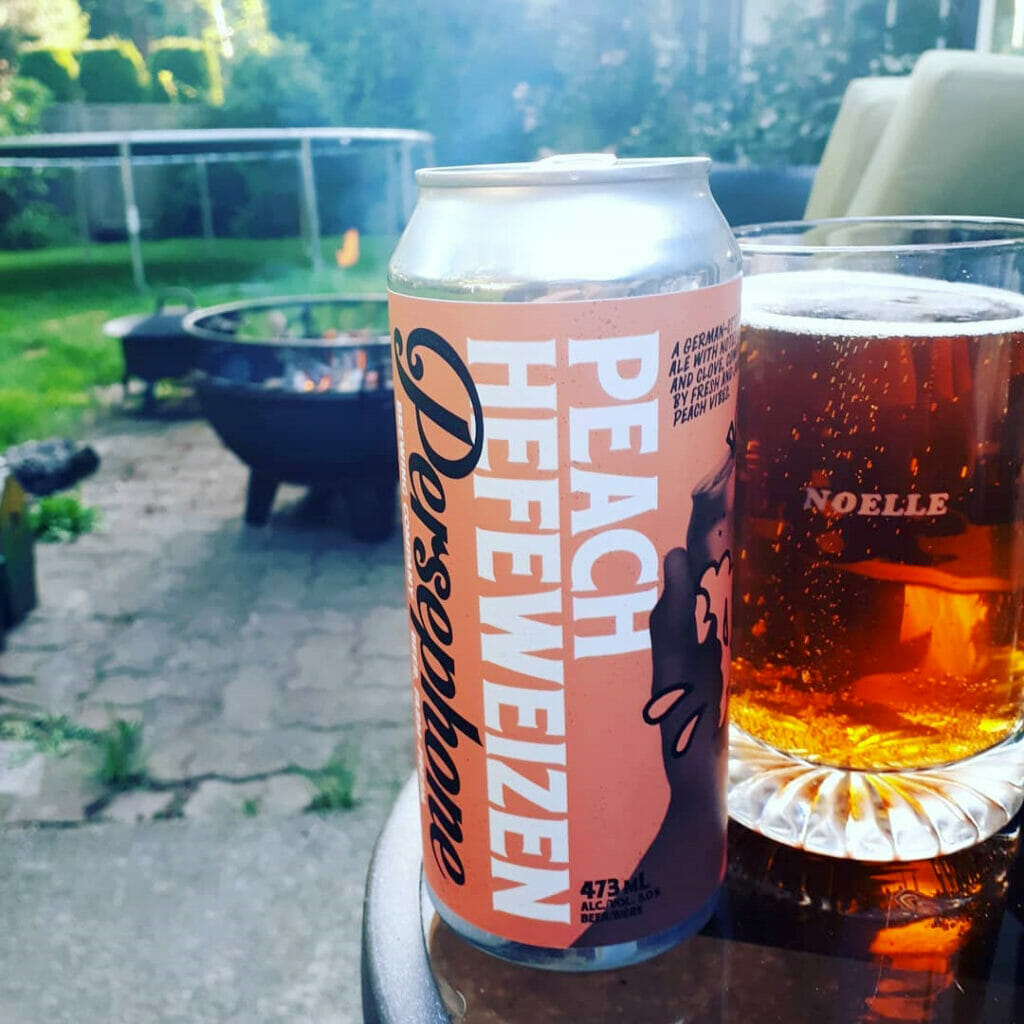 Persephone's Peach Heffeweizen by the patio fire pit