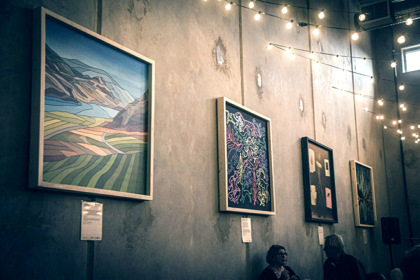 Murals hanging in the Cannery Brewing tasting room