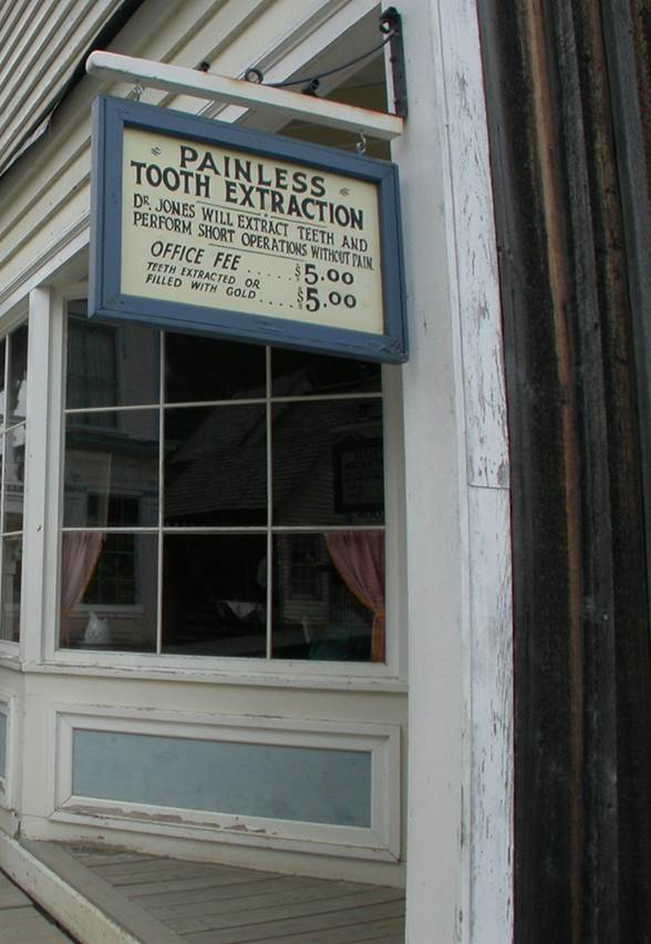 A replica sign outside of the Dentist Office at the historic Barkerville