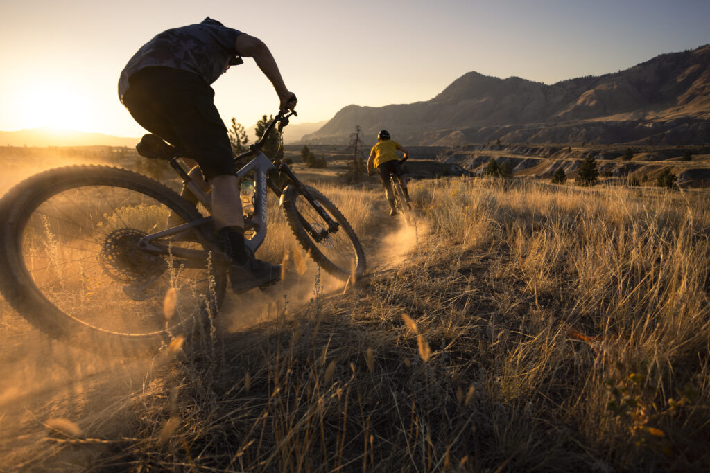 Jordan Hodder and Erin Holloway riding the Coyote Crossing trail in Kamloops, BC