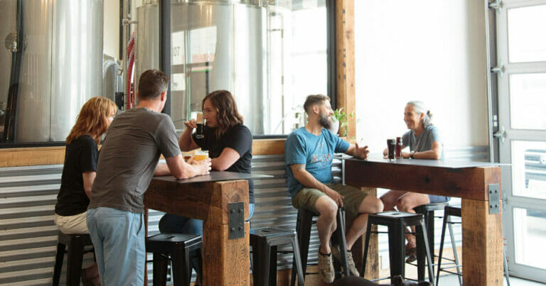 Dogs and customers in the tasting room at Unleashed Brewing, Kelowna