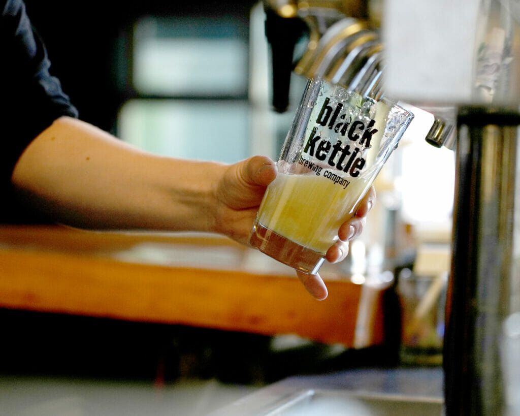 Pouring a pint at Black Kettle Brewing in North Vancouver