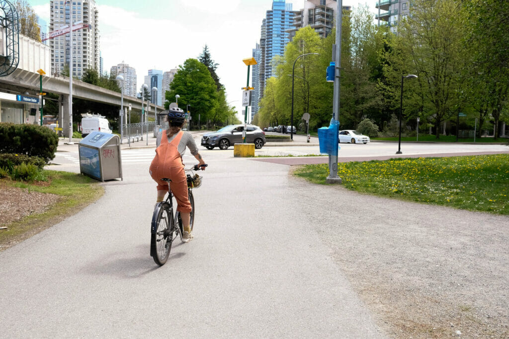 A cyclist approaches a road crossing near Metrotown in Burnaby