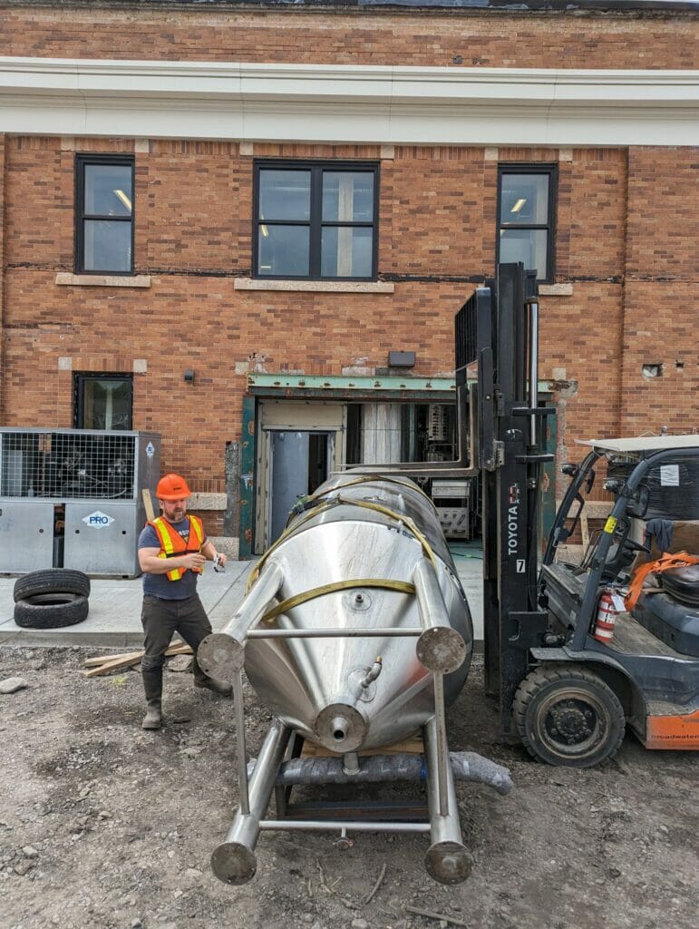 Moving the tanks from the old location to the new Wheelhouse Brewing brewery