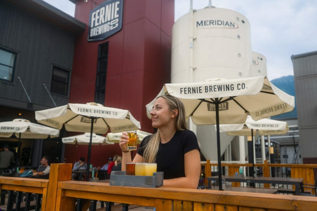 Enjoying a flight on the patio at Fernie Brewing Company