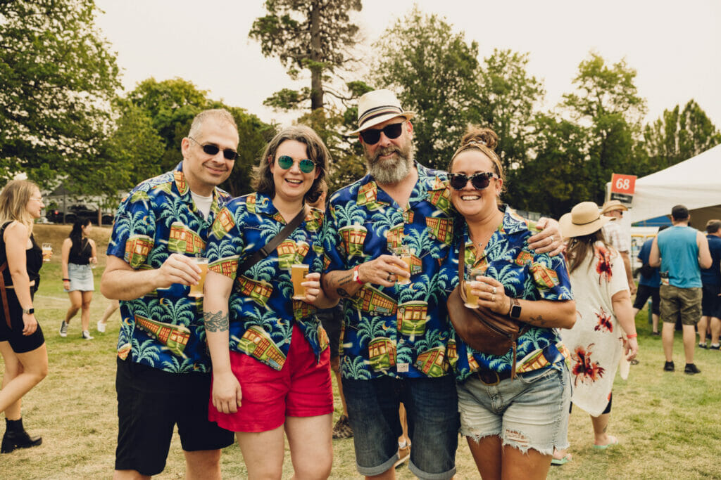 a group of people in Hawaiian shirts at the Great Canadian Beer Festival