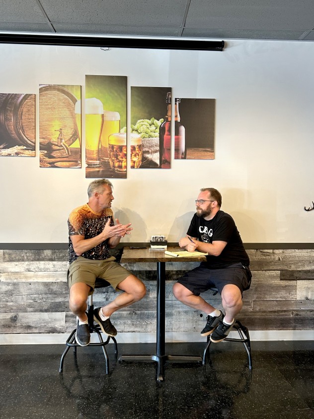 Ted Child chatting with Empty Keg Brew House owner Kyle Hall in Merritt, BC