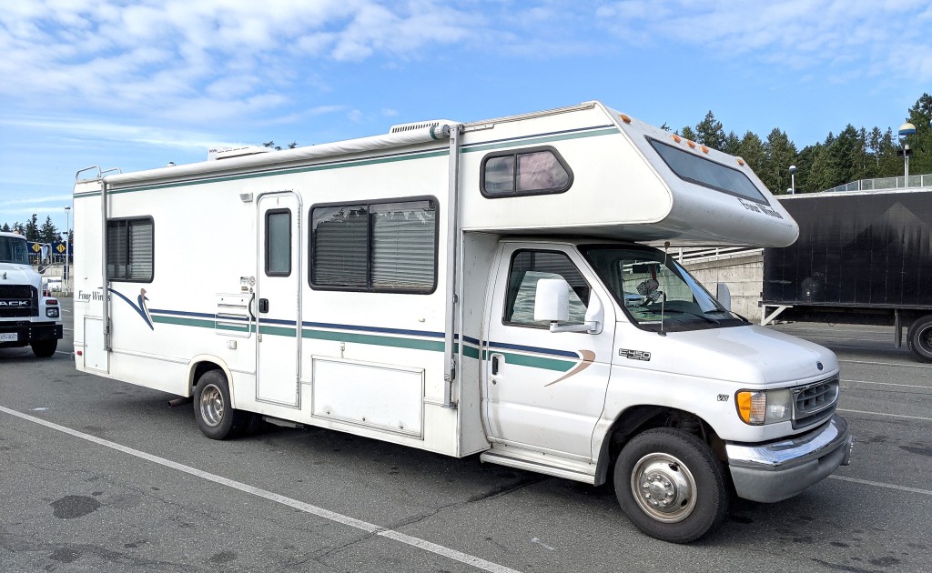 The RV sits packed and ready for adventure. 