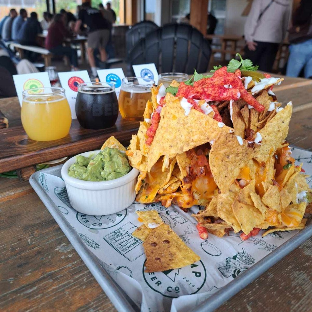 a flight and nachos at Camp Beer Co in Langley, BC